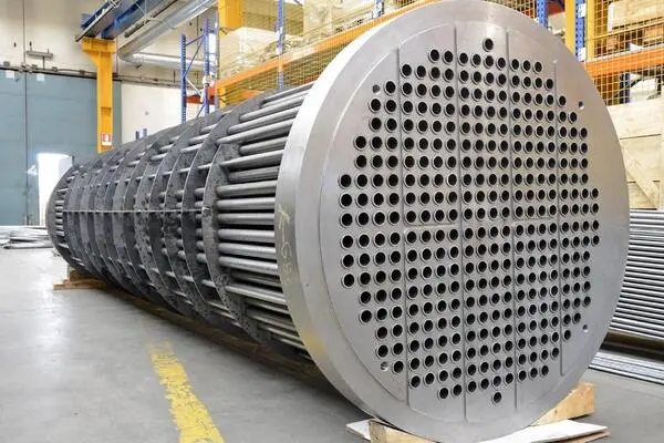 Titanium tube sheets for chemical processing